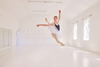 Buy stock photo Ballet dancing and jumping practicing in a dance studio or class preparing for a performance. Young elegant dancer, performer or ballerina in the air performing and leaping high