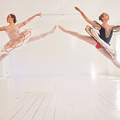 Jumping team of female ballerinas, leaping ballet girls or performers ...