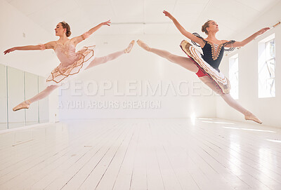 Buy stock photo Jumping team of female ballerinas, leaping ballet girls or performers in traditional tutu dress costume in the studio. Young, active and fit professional dancers dancing in balloon mid air pose.