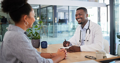 Buy stock photo Doctors appointment of a woman patient consulting a doctor in a hospital office. Happy working medical and healthcare worker work with a smile talking about insurance, wellness and health success