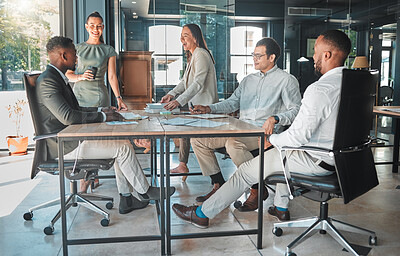 Buy stock photo Business meeting in a boardroom of colleagues talking and planning company growth strategy together. Group or team of diverse and happy employees having a discussion in a modern office
