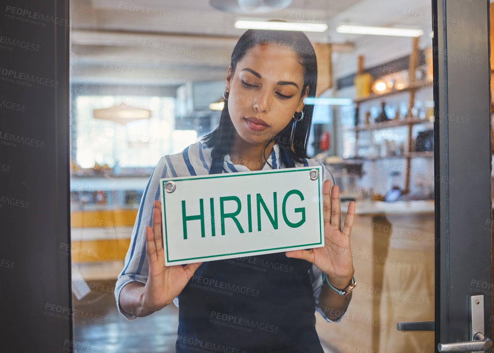 Buy stock photo Hiring, recruitment and about us advertising sign on a glass door of a small business, startup or coffee shop. Cafe store, restaurant or hr manager ready to hire new workers, employees and staff