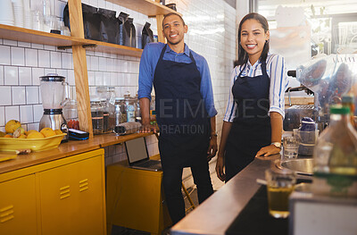 Buy stock photo Small business owners or partners standing in a coffee shop together are happy to serve and provide good service. Portrait of entrepreneurs smiling and excited about the cafe startup