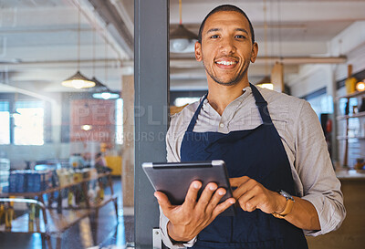 Buy stock photo Restaurant entrepreneur with tablet, leaning on door and open to customers portrait. Owner, manager or employee of a startup fast food store, cafe or coffee shop business standing happy with a smile