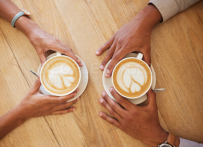Buy stock photo Creative latte art, cappuccino and coffee drink in cafe with couple and friends enjoying cup of java with milk froth together. Closeup of people hands from above meeting and drinking in restaurant