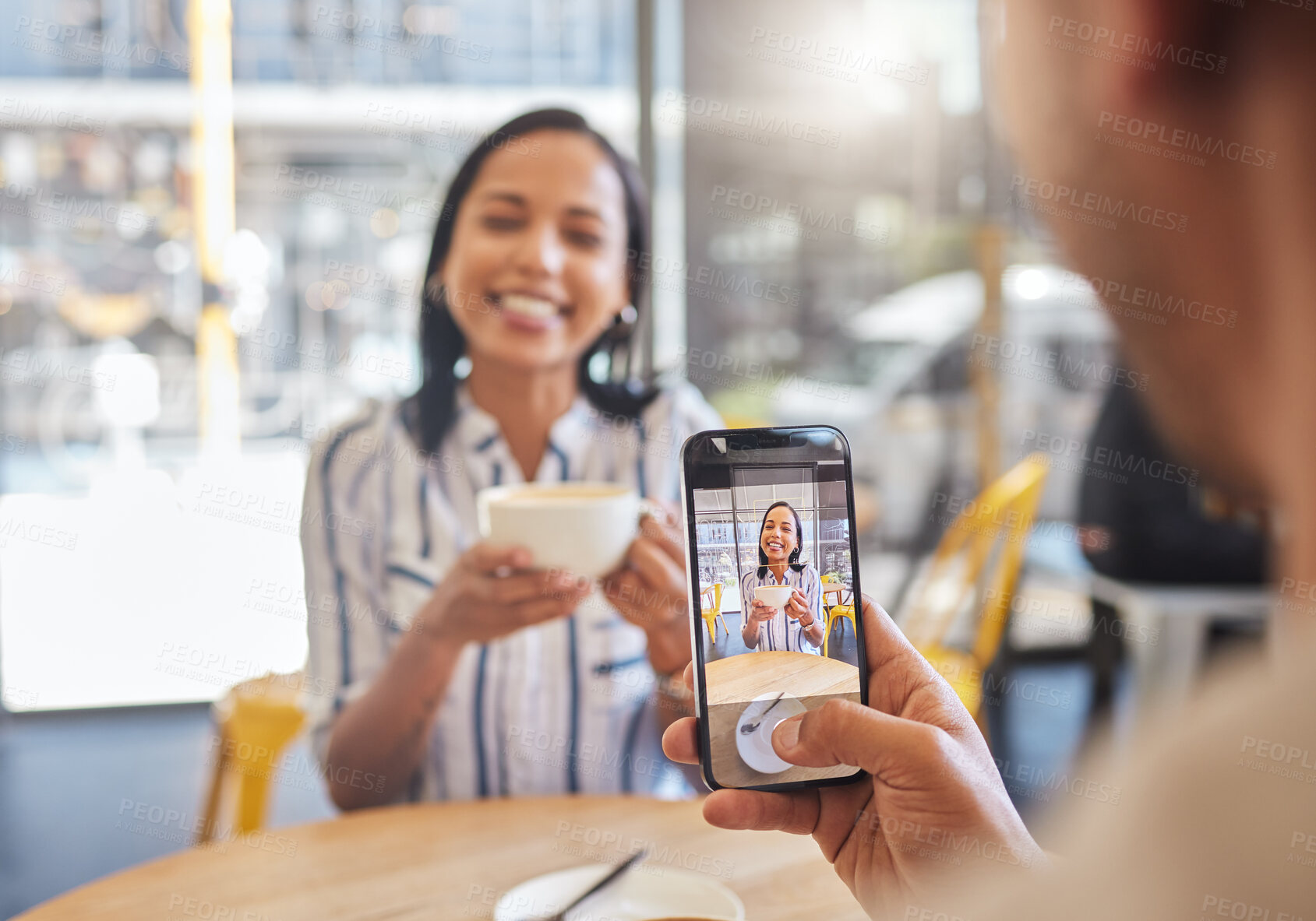 Buy stock photo Love, coffee and a cafe, a happy couple meeting for a breakfast date in the city. A man taking a photo of woman on his phone, she has a smile on her face and a cup in her hands, friends and memories.