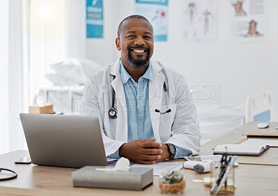 Buy stock photo Doctor, medical healthcare worker and male physician at hospital or clinic working with stethoscope and electronics. GP man on laptop reading emails, patient records and documents in covid pandemic