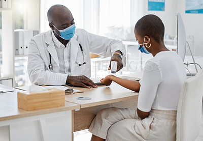 Buy stock photo Doctor doing covid wrist temperature test on patient with face mask while consulting in appointment checkup, hospital office or clinic. Woman with healthcare insurance at a covid 19 medical facility