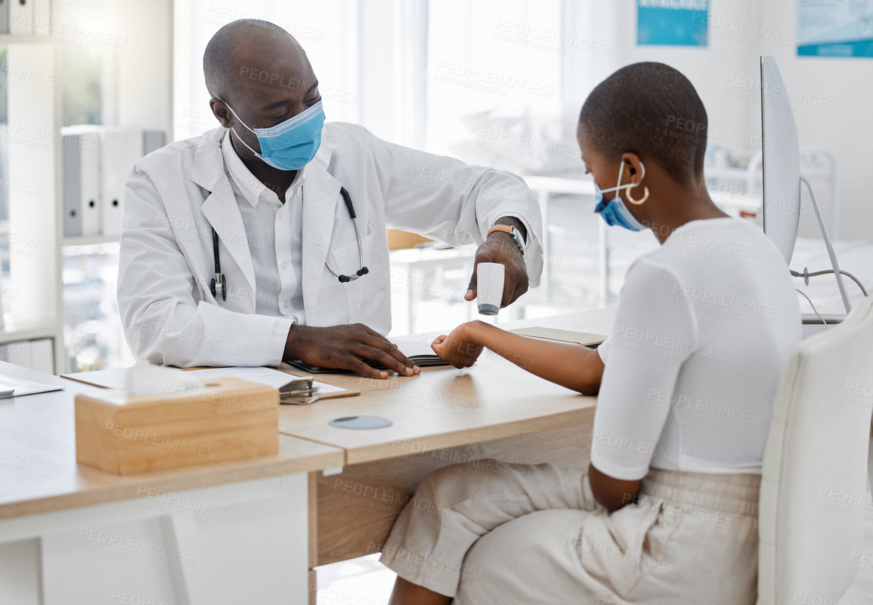 Buy stock photo Doctor doing covid wrist temperature test on patient with face mask while consulting in appointment checkup, hospital office or clinic. Woman with healthcare insurance at a covid 19 medical facility