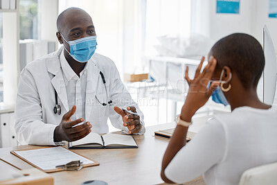 Buy stock photo Doctor appointment by a woman with a headache or covid symptoms consulting a healthcare professional at the hospital. Black male medical worker or GP has a consultation with an ill or sick patient