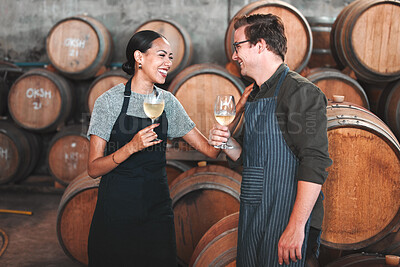 Buy stock photo Winemaker business partners having fun talking at winery, white wine tasting and laugh. Young sommelier testing flavor and alcohol drink blend, bonding in cellar, celebrating good quality Chardonnay