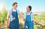 Interracial couple farming on a farm in nature together, farmers on land in natural environment for agriculture and green sustainable living in countryside. Sustainability and environmental growth