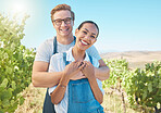 In love, countryside and farmer couple enjoying grape vine plant growth development in summer with flare or sunlight and blue sky, Happy, young rustic people hugging on a sustainable farm or vineyard