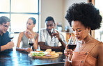 Wine tasting, friends and luxury in a restaurant with healthy organic fruit with cheese on a food table. Alcohol, diversity and young happy people in discussion at a relaxed dining or party event