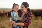 Love and family on the farm with a cattle farmer and her daughter in the farming and agricultural industry. Agriculture, sustainability and relationship with a mother and her little girl outside