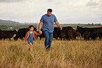 Agriculture, sustainable farm owner dad, kid and cows with rustic lifestyle, countryside living and grass field background. Father with child and livestock or cattle for dairy, meat or beef industry