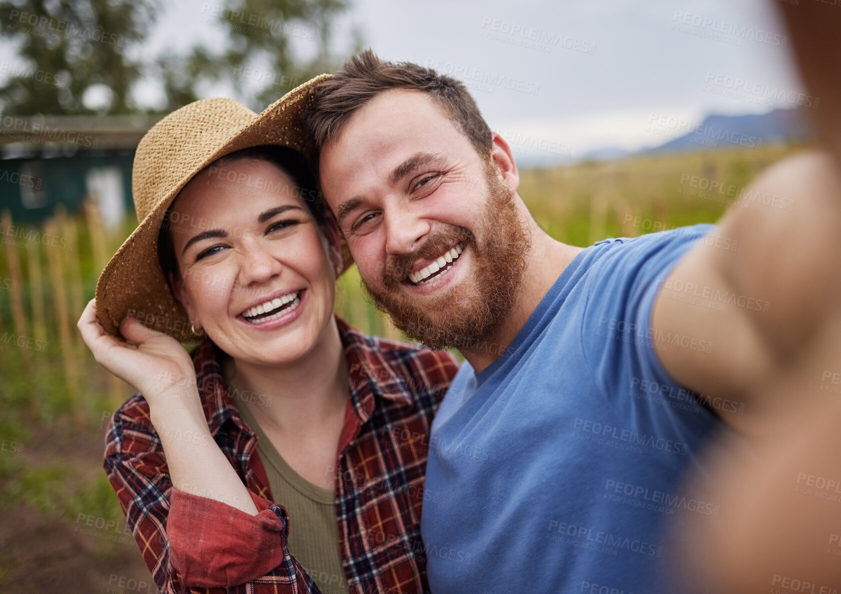 Buy stock photo Smile, selfie and nature of happy couple in the countryside smiling, bonding and taking a photo together. Smiling man and woman embracing life, love and relationship in a natural  outdoor background.