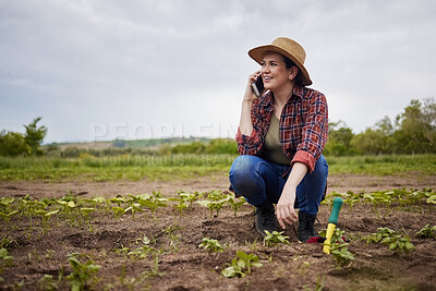 Buy stock photo Agriculture farmer talking or networking on phone, happy with success or small business growth on a farm. Sustainability woman with good news on a cellphone call, planting vegetable crops or plants
