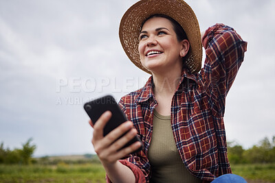 Buy stock photo Agriculture, nature and 5g connection by farmer texting on a phone, reading social media while relaxing outdoors. Happy worker browsing the internet for natural sustainability tips, products online