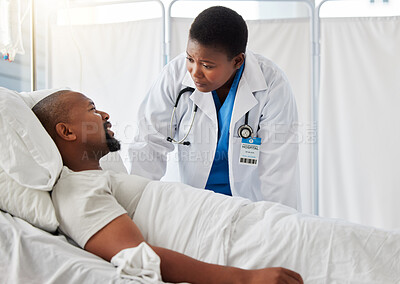 Buy stock photo Consulting, hospital plan and healthcare with a sick patient talking to a doctor after cancer diagnosis. Caring health care professional support and explain treatment option to a worried man in bed