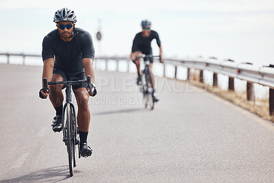 Buy stock photo Bike, fitness and exercise with a man cyclist training on a bicycle for sport, health or exercise outside. Sports, wellness or fitness with a healthy athlete doing a workout for cardio and endurance 