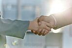 Handshake, greeting and meeting business people in an agreement or partnership in unity, trust and support. Closeup of corporate professionals hands in collaboration or thank you gesture
