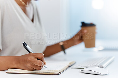 Buy stock photo A business woman writing notes in a notebook or managing her schedule in a diary or completing a journal in an office. Closeup of an assistant working on a notepad learning from the internet