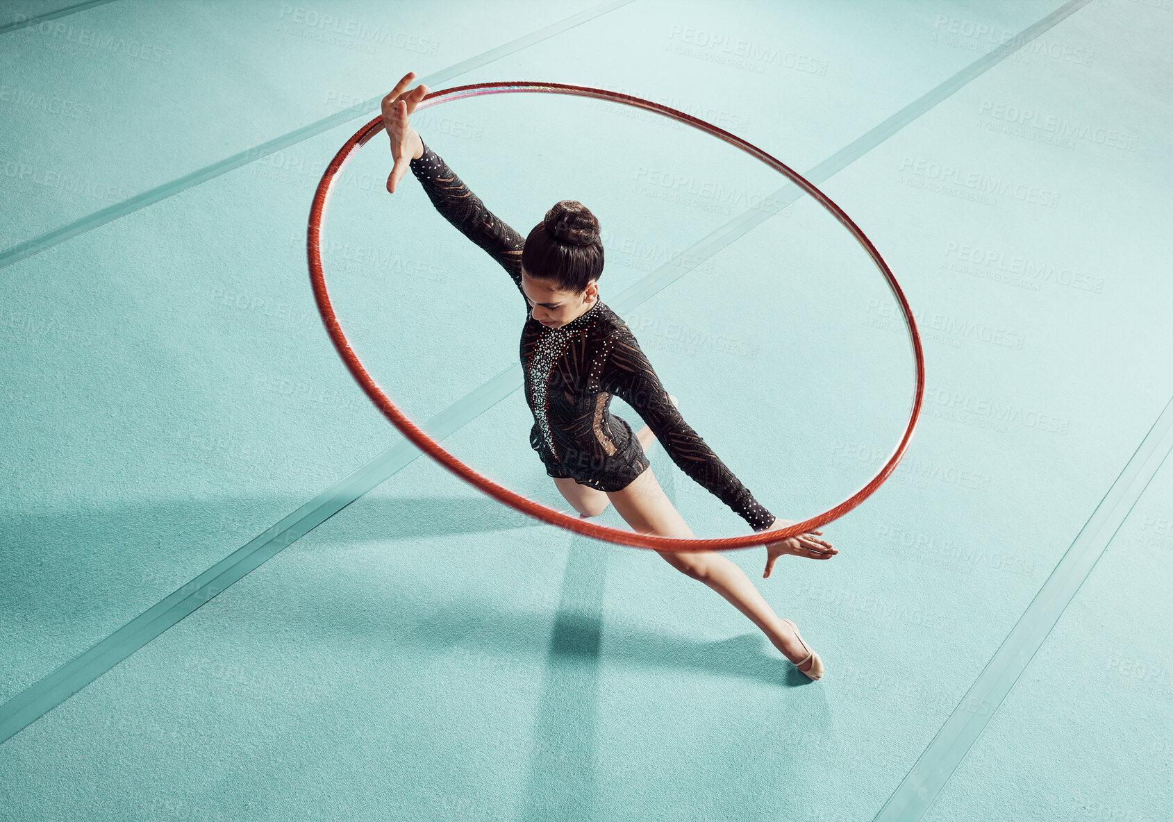 Buy stock photo Gymnastics woman with ring for training, fitness and exercise or workout. Gymnast girl at sport competition event in gym or gymnastic center with motivation, goal and winner mindset top view

