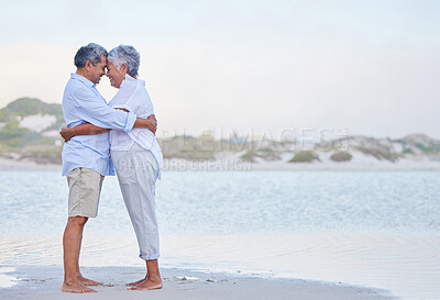 Buy stock photo Senior couple retirement, beach holiday and travel vacation at sea with hug, love and care together. Elderly people in happy marriage, intimate hug and romantic relationship relax at ocean outdoor