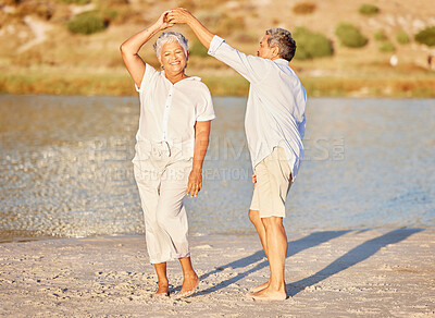 Buy stock photo Sand, beach and dancing happy senior couple on summer retirement holiday travel or spring vacation by water. Love  fun and elderly playful dancer people on outdoor sea, ocean and sunshine nature trip