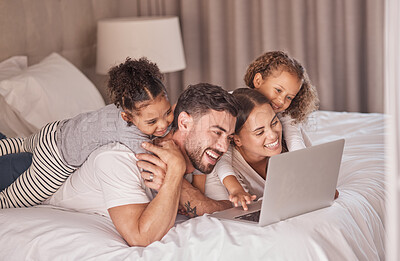 Buy stock photo Happy family streaming movies on laptop in bedroom for online entertainment to relax during the night at home. Smile, mother and father with girls, children or kids watching tv via internet together