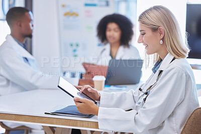 Buy stock photo Teamwork, innovation and doctors working on digital tablet in a meeting or conference, reading and research together. Health care workers collaboration on online search for breakthrough or discovery