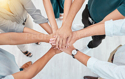 Buy stock photo Support, trust and collaboration of business people pile hands together in agreement of partnership in an office. Teamwork, team building and celebrating company growth and diversity