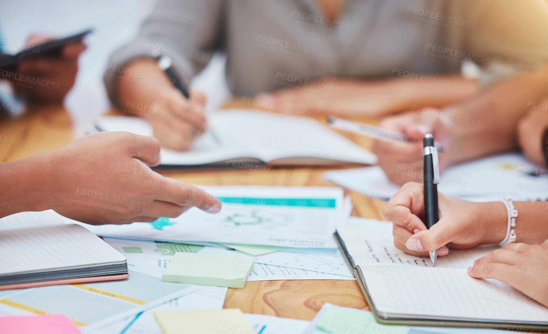 Buy stock photo Target audience, research and hands with marketing paper, notebook and post it sticky note on office desk or table. Closeup teamwork, collaboration and brand strategy while writing media advertising