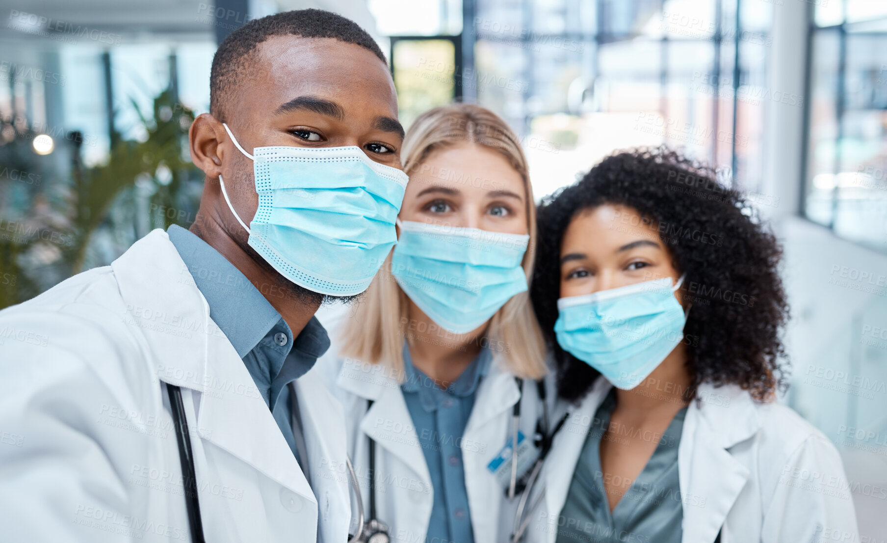 Buy stock photo Teamwork, healthcare and covid with a doctor, nurse and medical worker working as a team with a mask in a hospital. Collaboration, medicine and health for wellness, insurance and professional care