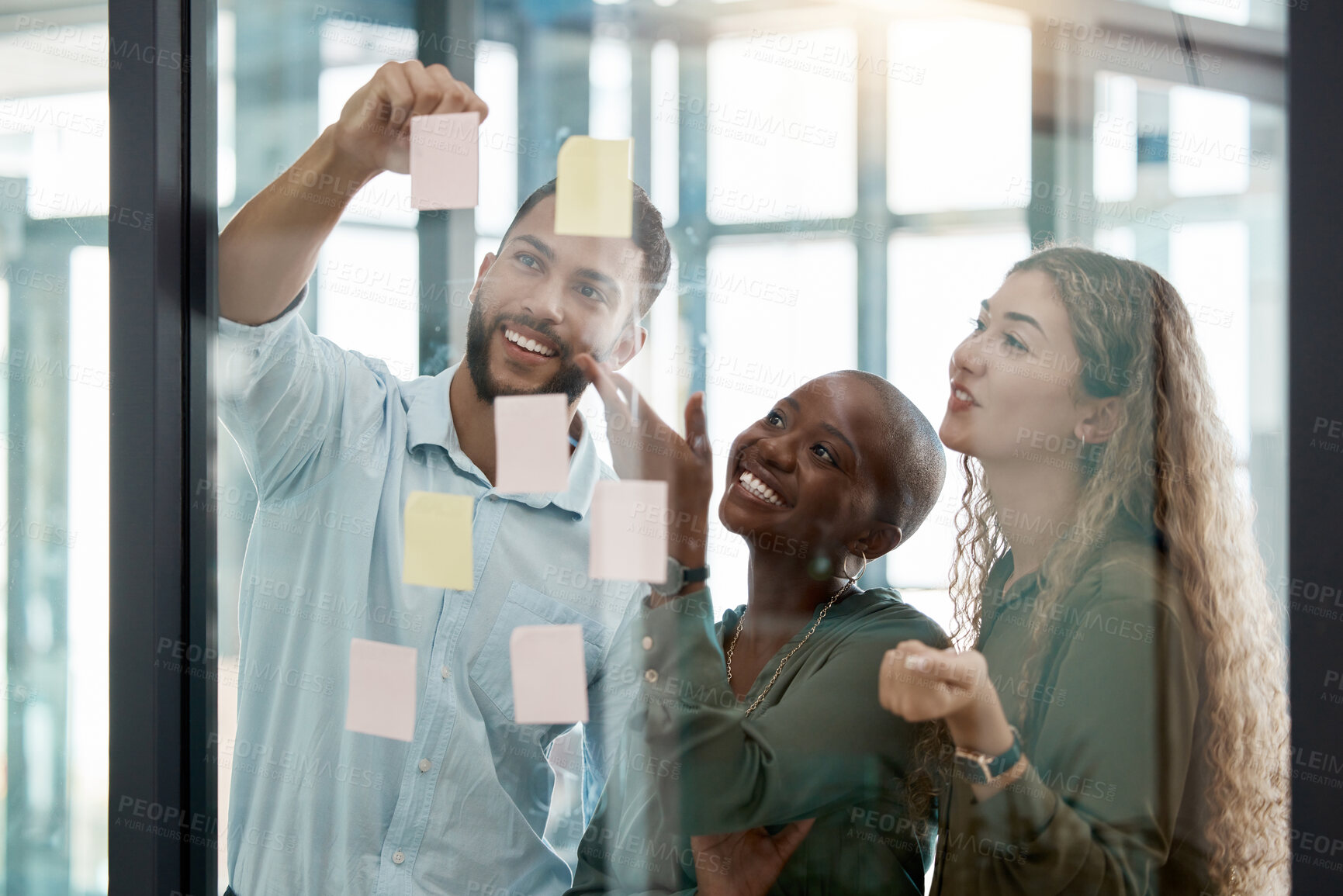 Buy stock photo Diversity, collaboration and team in a business brainstorming strategy for planning and sticky notes. Creative people sharing ideas, plan and schedule work tasks in teamwork and delegation at office.