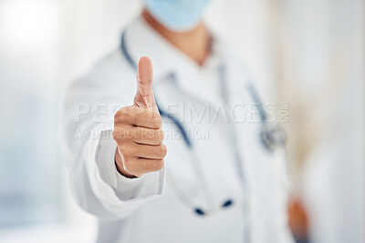 Buy stock photo Medical doctors hand show thumbs up for success or goal working at a hospital. Giving support, motivation and good service in an office at clinic. Healthcare worker showing winning sign or emoji