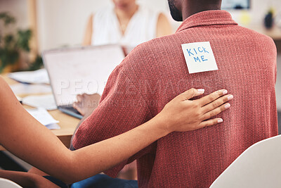 Buy stock photo Office prank, comic and work bullying of a corporate team placing a kick me sticky note. Working, collaboration and business teamwork playing a april fool funny, comedy and  joke on a employee