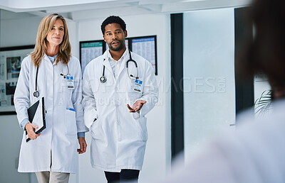 Buy stock photo Doctors, teamwork and healthcare expert talking, consulting and planning surgery strategy. A medical team discuss medicine research and diagnosis or treatment plan in a hospital or clinic