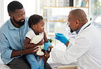 Child doctor, pediatrician and healthcare worker with a kid patient and father holding a shot. Children and family hospital or baby clinic with medical consultant help and work to get a boy healthy 
