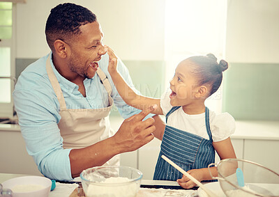 Buy stock photo Father, playing and girl baking in family kitchen with flour, food and dough while learning to bake cake. Happy dad teaching playful daughter cookies recipe with excited young kid helping at home