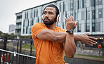 Fitness, runner or black man stretching in city for running training, cardio exercise or workout start in London. Wellness, mindset or healthy sports athlete in headphones streaming radio or podcast