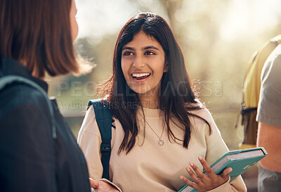 Buy stock photo Happy, university and woman student from India laughing and talking about a test. College, book and happy woman speaking to campus students about education, learning and school studying with a smile