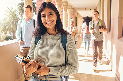 Buy stock photo University student, indian woman and portrait at campus outdoor with books of learning, education or knowledge, scholarship and motivation. Happy, smile and young college student, studying or academy