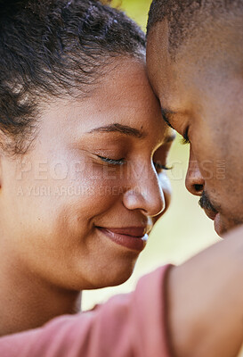 Buy stock photo Face, love and happy with a black couple hugging together outdoor for romance, dating or relationship. Smile, trust and safe with an attractive young woman and man bonding outside with a hug