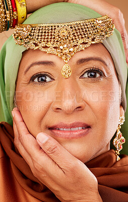 Buy stock photo Face, beauty and jewelry on egyptian woman with hands on face for arab culture with hands on face for fashion and skincare. Portrait of a mature muslim female from Egypt with makeup and cosmetic