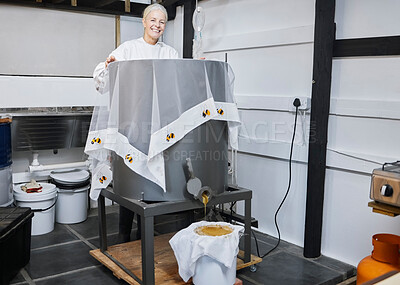 Buy stock photo Beekeeping, honey production and woman with a machine for warehouse working, sustainable work and management of process. Happy, agriculture and portrait of a beekeeper with sweet food in storage