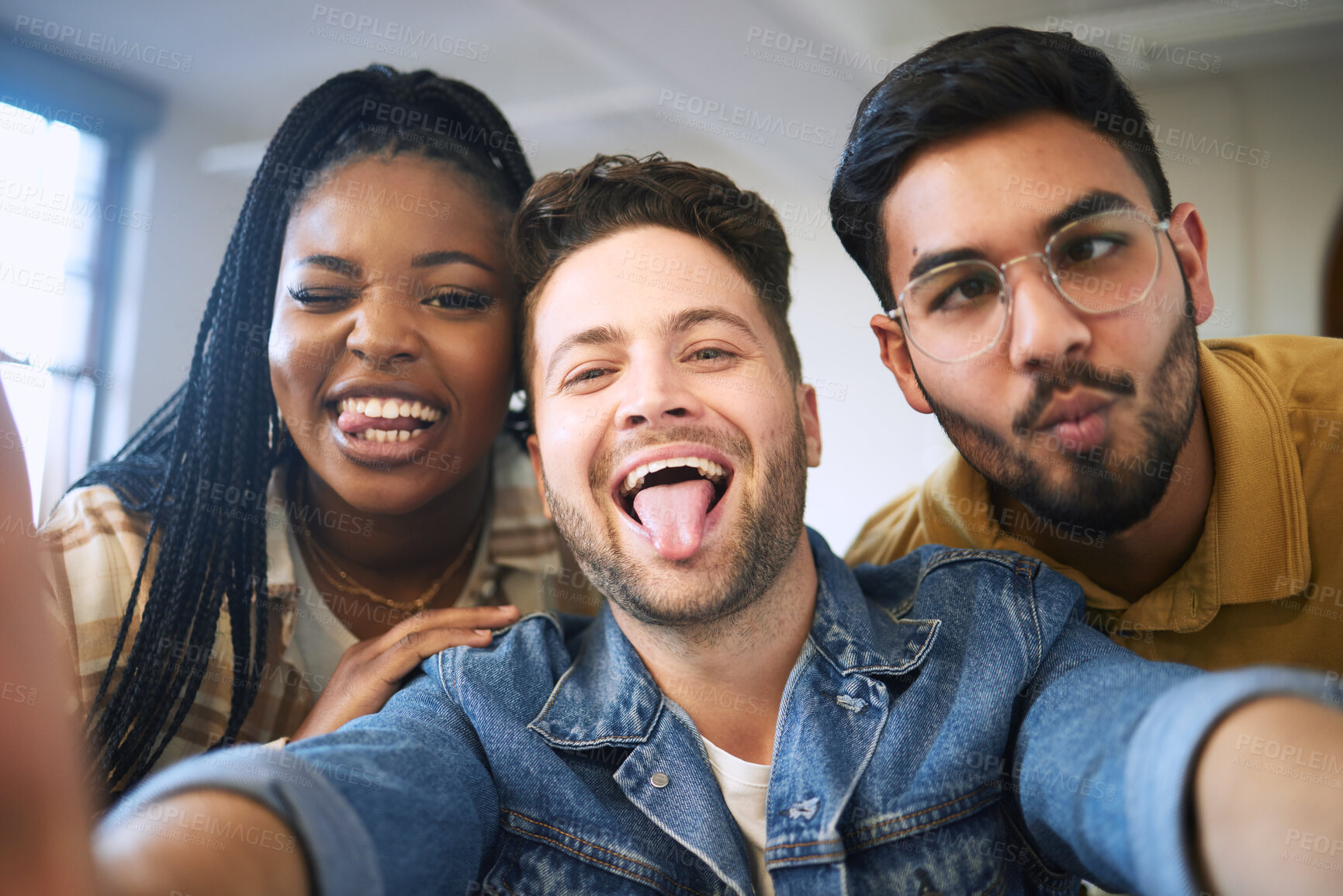 Buy stock photo Comic, selfie and portrait of friends at university with funny face expression in humor, fun and crazy picture. Education, diversity and happy group of students at college, school and academic campus