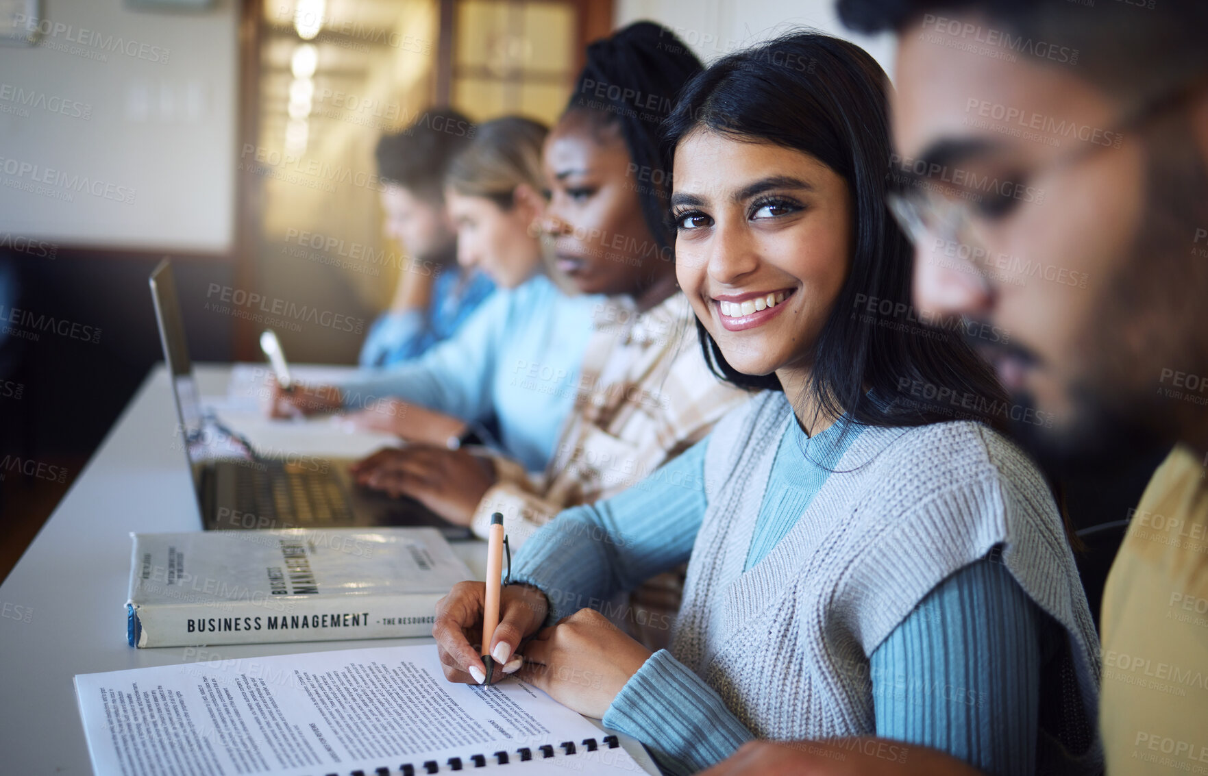 Buy stock photo College student writing notes for business management in classroom, course and campus. Portrait, young indian girl and university student happy for learning, education and studying at finance academy