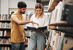 Students, library and discussion for man, woman or book for knowledge, learning or information in university. Bookshelf, conversation and reading for college student, friends or education for success